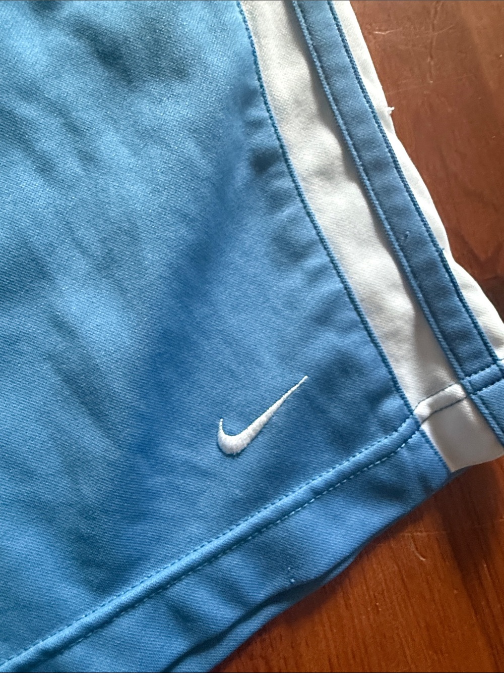 Nike Light Blue Men’s Athletic Shorts with White Swoosh Size Large